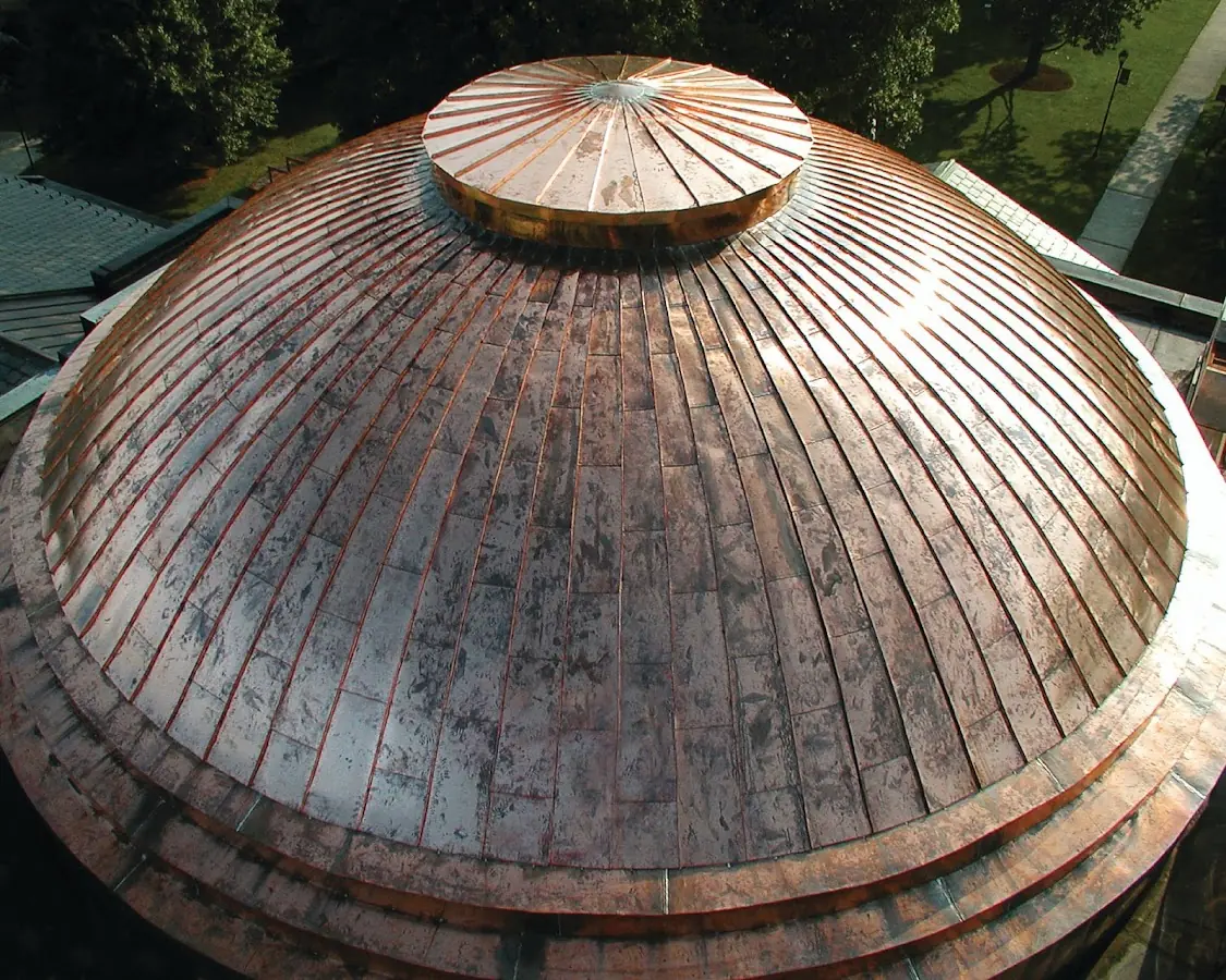 Craftsman Roofing crew installing a new roof in Pershing Place